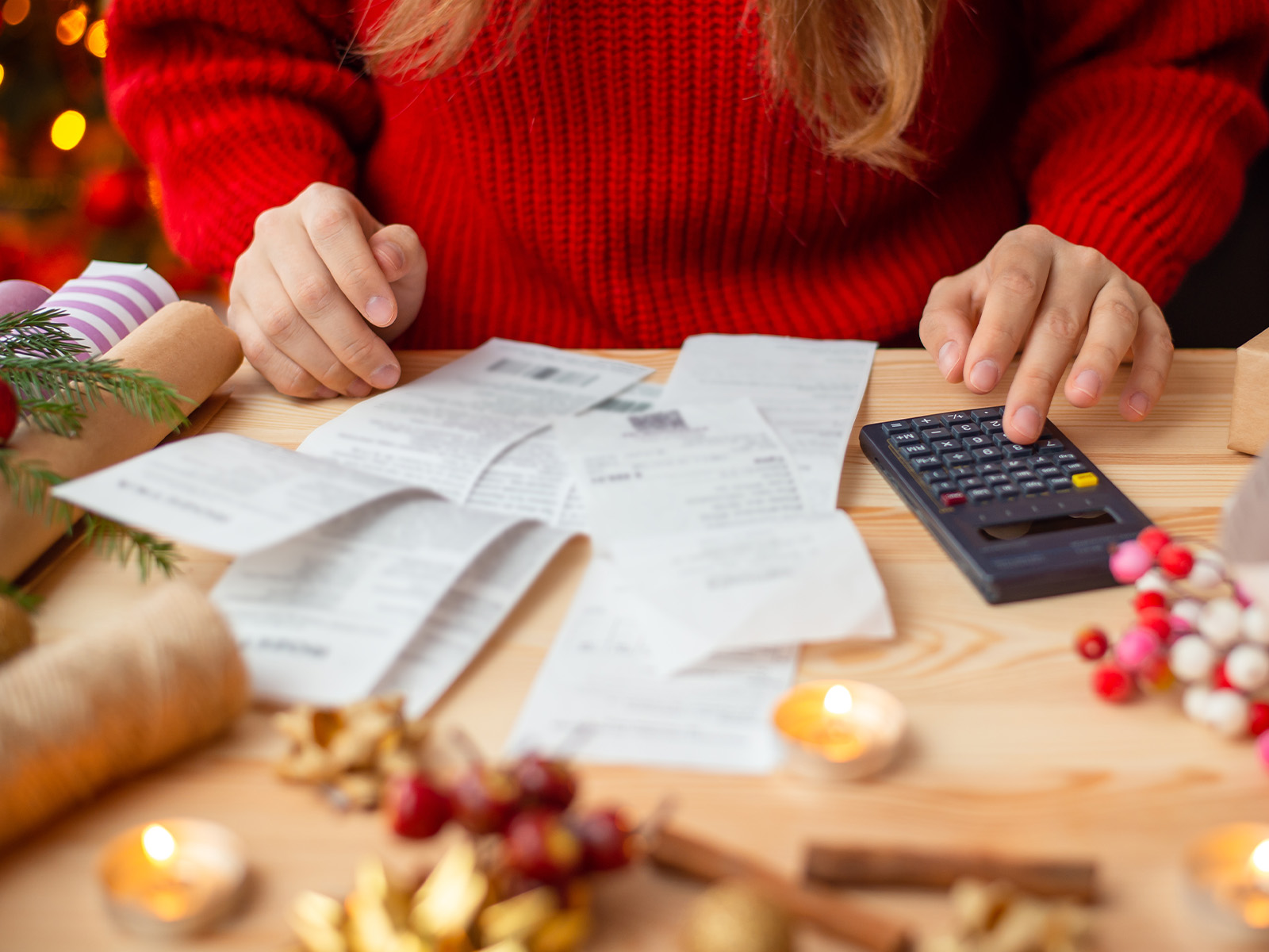 Woman checking her bills after Christmas