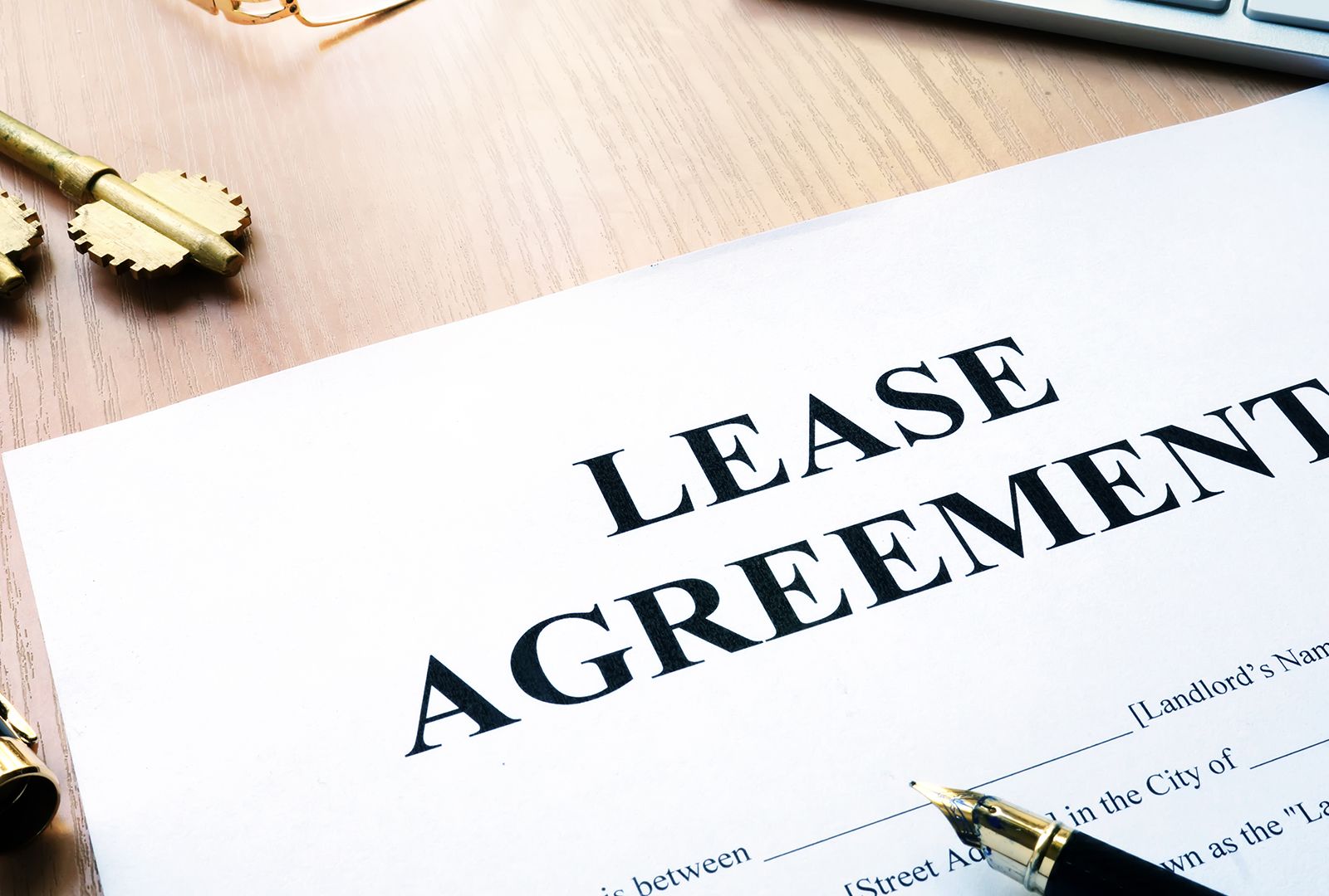 Lease agreement and pen on a desk