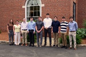 The nine local students participating in the internship program.