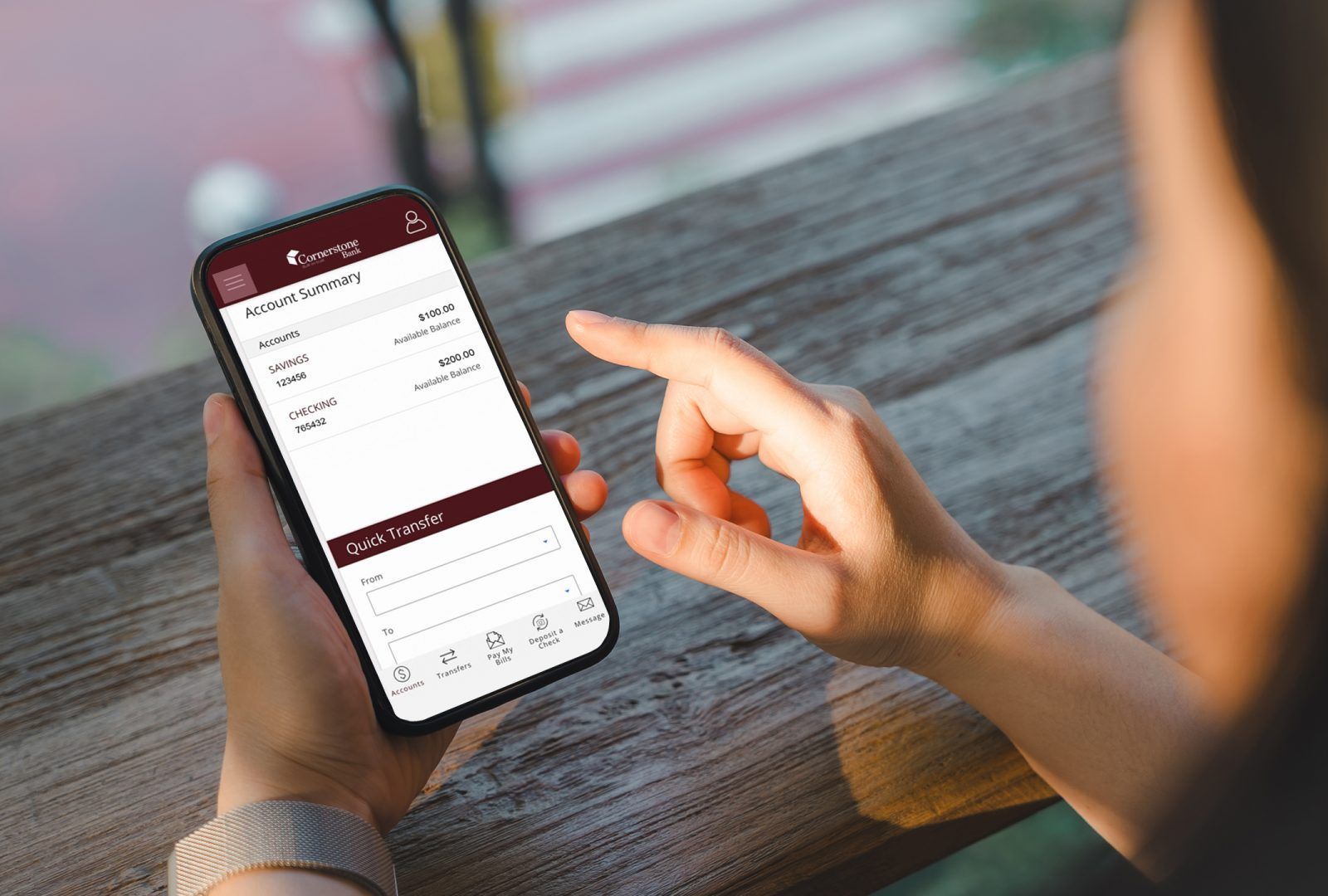 Person online banking on their phone